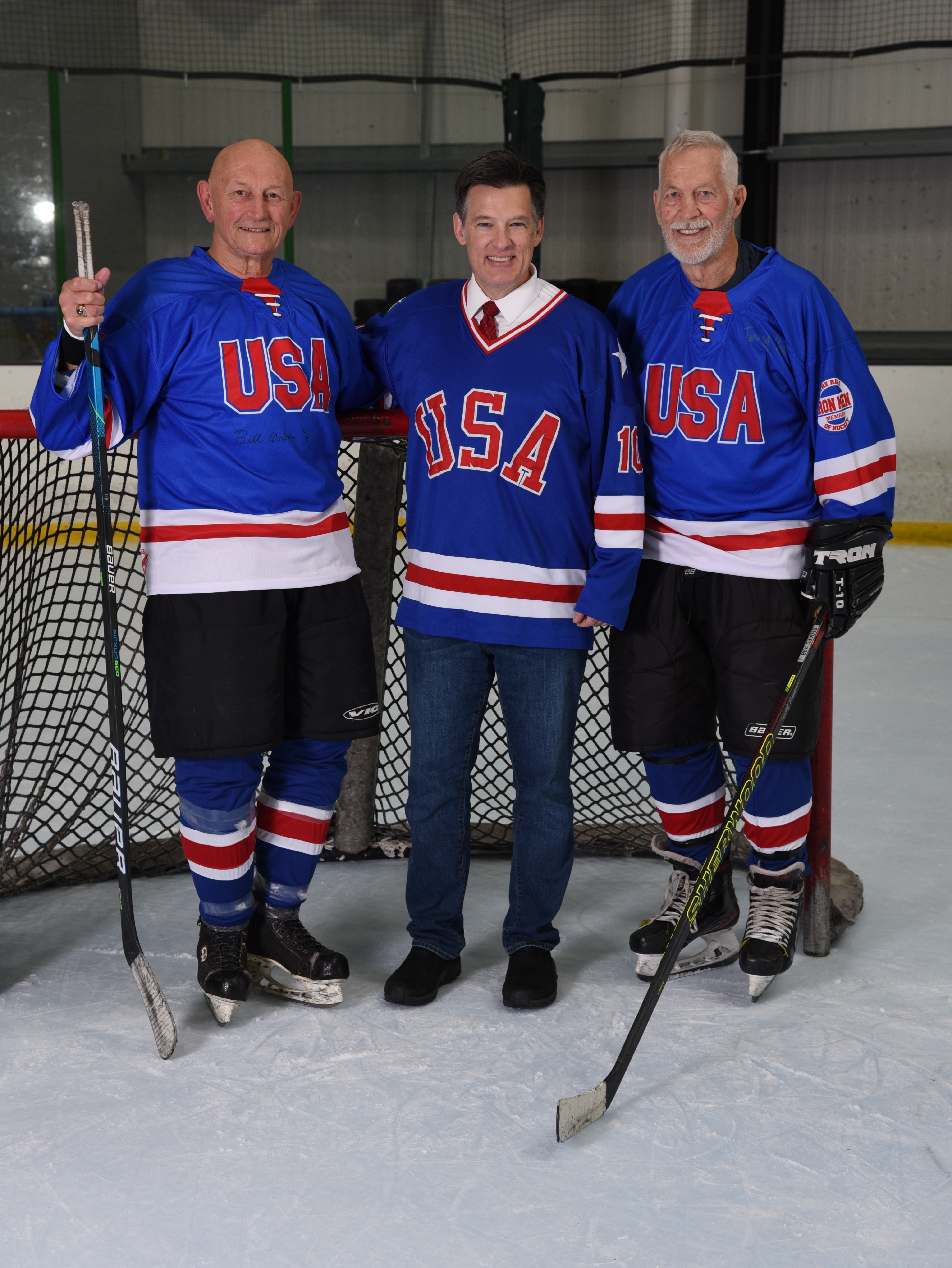Bill Orban and Terry Harper with event announcer Sean Moynihan during Hall of Fame weekend