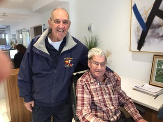 Larry Bergeron visiting a retired player 2018