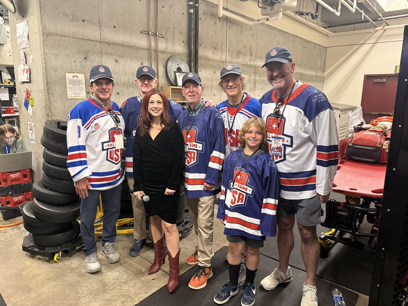 Pat Long and Fred Merchant with the group at the Colorado Avalanche Alumni vs University of Denver Alumni game