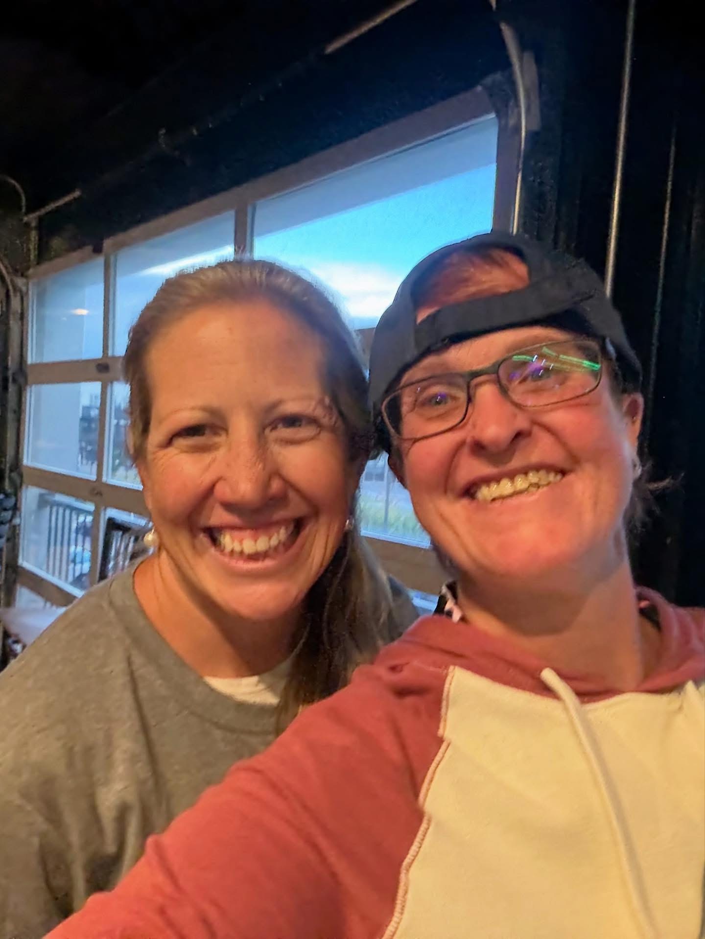 Shannon Lusso and Sherry Sulak, Long Hockey volunteers who coordinated the event setup
